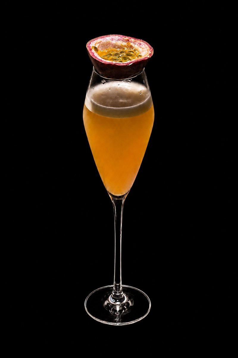 A Salon cocktail with a passionfruit garnish